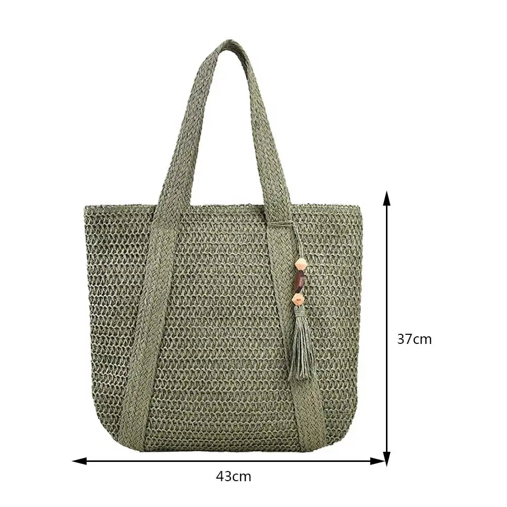 Khaki woven straw tote bag styled for a beach day