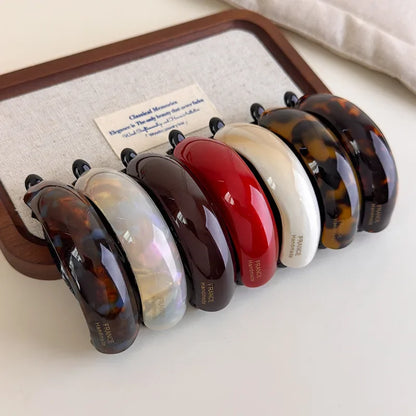 Earth-tone claw clip for thick and thin hair